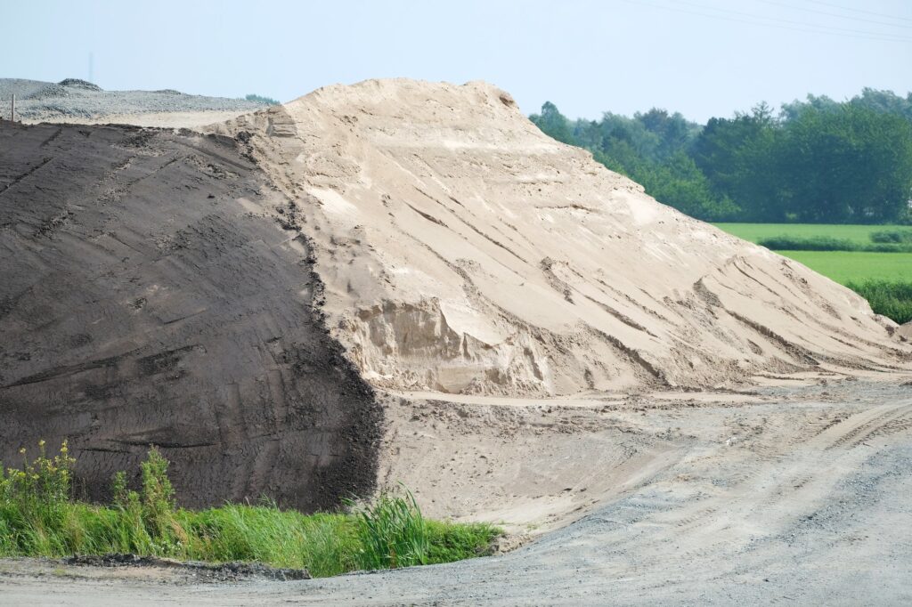 Closeup of a large sandhill; building material